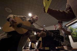Eric George, a Burlington-based folk artist, joined dozens in the governor's office to protest the Vermont Gas pipeline on Monday at the Pavilion in Montpelier.