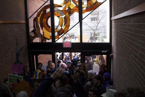 Protesters marched into the Pavilion in Montpelier on Monday to protest the Vermont Gas pipeline.