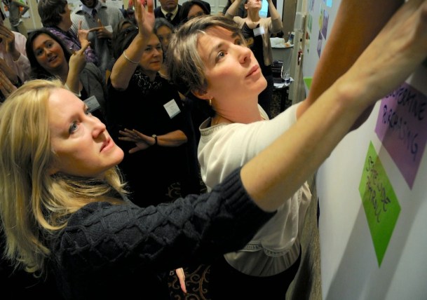 Members of the Green Mountain Imperative planning team corralled more than 20 competing priorities into a handful of discussion areas to keep the momentum moving on Day 2. Photo by Hilary Niles/VTDigger
