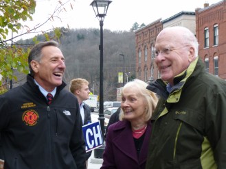 Gov. Peter Shumlin (left) joins Sen. Patrick Leahy and his wife, Marcelle. Photo by Anne Galloway/VTDigger