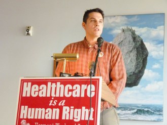 James Haslam, executive director of the Vermont Workers Center, pushed for universal health care at a news conference Monday in Burlington. Photo by Morgan True/VTDigger