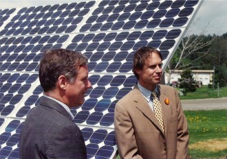 Leigh Seddon, right, joins Gov. Howard Dean in commissioning the state’s first solar array in May 1994, at the General Services Center in Middlesex. Provided photo