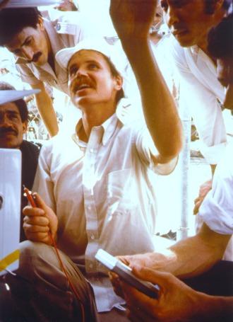 Leigh Seddon, in this 1984 photo, tests the solar array that Solar Works installed for water pumping in Yemen. Seddon is surrounded by the Yemeni engineers whom Solar Works was training. Provided photo