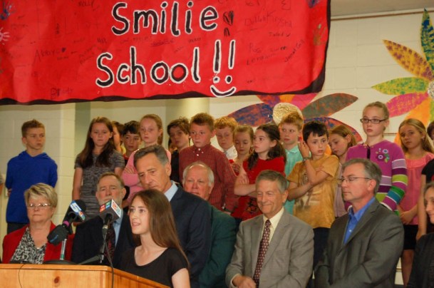 Julia Dunn, a student member of the Mount Mansfield Modified Union School District Board, speaks at the bill signing for H.361 at the Smilie School on Tuesday. 