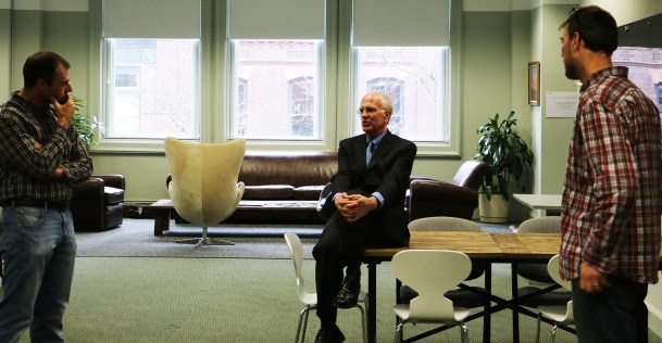 Designbook founders Aaron Pollack (l.),and Kyle Clark (r.) speak to Rep. Peter Welch (center.)