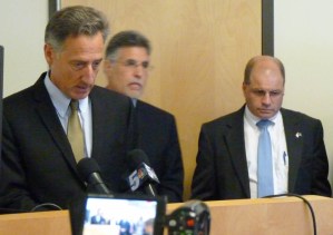 Gov. Peter Shumlin and chief of health reform Lawrence Miller attend a news conference at Vermont Health Connect headquarters in Winooski on Monday to announce that a key function of the state's health insurance exchange website is operational. Photo by Morgan True/VTDigger