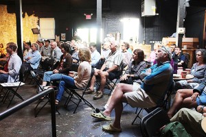 Audience members listen at ArtsRiot on June 17, as city planners present PlanBTV South End. (Photo by Jess Wisloski)
