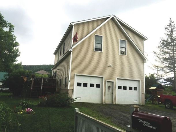 Chris and Susan Wood’s new home on Randall Street in Waterbury — a flood-proofed garage, with a modular home on top. Courtesy photo