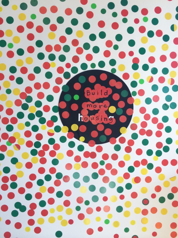 Amey Radcliffe's piece, following a hanging at Feldman's Bagels. The dots represent how people feel about building more housing in the South End. Photo courtesy of the artist.