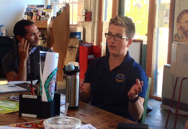 Megan Moir, stormwater program manager of the Burlington Public Works Department, speaks to residents in the South End on July 28, 2015.
