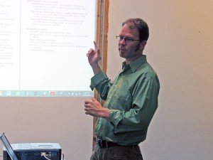 Director of the Department of Public Works Chapin Spencer talks to South End residents about transportation and modality plans for the neighborhood, at SEABA, on Aug. 21, 2015.