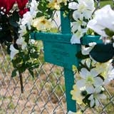 A memorial to Leonardo Espinabarros Telles hangs on fencing at the Lamoille County Field Days Fair Ground in Johnson. VTD/Josh Larkin