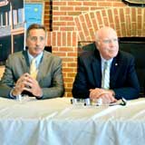 AnC Bio announcement at Gateway Center in Newport on July 29. From left, Ariel Quiros, chairman AnC Bio US, Governor Peter Shumlin, Senator Patrick Leahy, William Kelly, advisor to AnC Bio, and, at podium, Bill Stenger, partner with Mr. Quiros at Jay Peak Resort, and investor in AnC Bio. Photo by Joseph Gresser.
