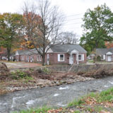The Whetstone Brook flows beside Melrose Terrace in West Brattleboro. During Tropical Storm Irene on Aug. 28, the brook overflowed its banks and damaged 26 apartments. Photo by Randolph T. Holhut.