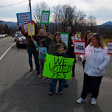 Pro-wind residents of Lowell show their support for the Kingdom Community Wind project along Route 100 in Lowell. VTD/Josh Larkin