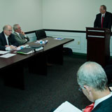 Fletcher Allen Interim President and CEO Dr. John Brumsted gives testimony at the BISHCA public hearing. VTD/Josh Larkin