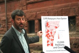 Greg Marchildon, state director for AARP Vermont, says the states two largest utilities need to pay Vermont ratepayers $21 million in return for a bailout more than 10 years ago. Photo by Alan Panebaker