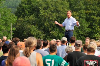 Gov. Peter Shumlin addresses a volunteer crew in Waterbury cleaning up after Tropical Storm Irene in 2011. Photo by Jeb Wallace-Brodeur
