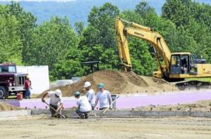 Construction workers make progress Wednesday on the new state police barracks in Westminster. The new facility will consolidate the Rockingham and West Brattleboro forces. Photo by Kristopher Radder/Brattleboro Reformer
