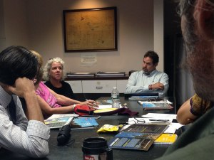 Burlington Planning Commission member Jennifer Wallace Brodeur, explains why she thinks housing needs to be considered in planBTV South End, while David White, director of planning, listens, at a Sept. 29, 2015 executive session. Photo by Jess Wisloski/VTDigger