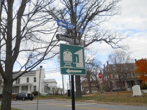 The sign in the center of Middlebury awaits a train. Photo by C.B. Hall/for VTDigger 