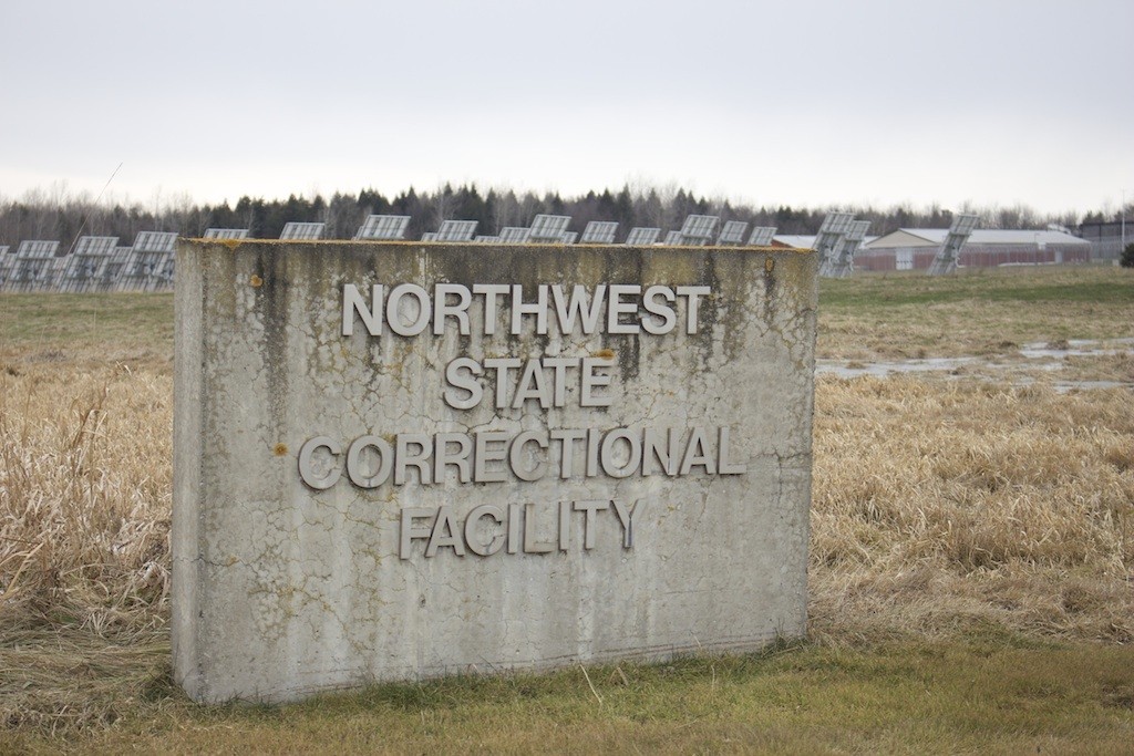 A sign displaying the name of a northwest state prison facility.