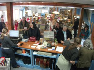 Shoppers swarm the Black Friday 2011 reopening of Bartleby’s Books in Wilmington three months after flooding from Tropical Storm Irene. Photo by Kevin O’Connor/VTDigger