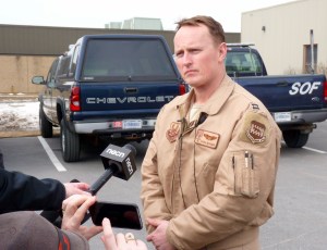 Captain Cash Shaner speaks with reporters just after landing an F-16 at the Vermont Air National Guard base in South Burlington. Photo by Morgan True / VTDigger.