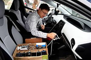 Corey Chase checks his power cord