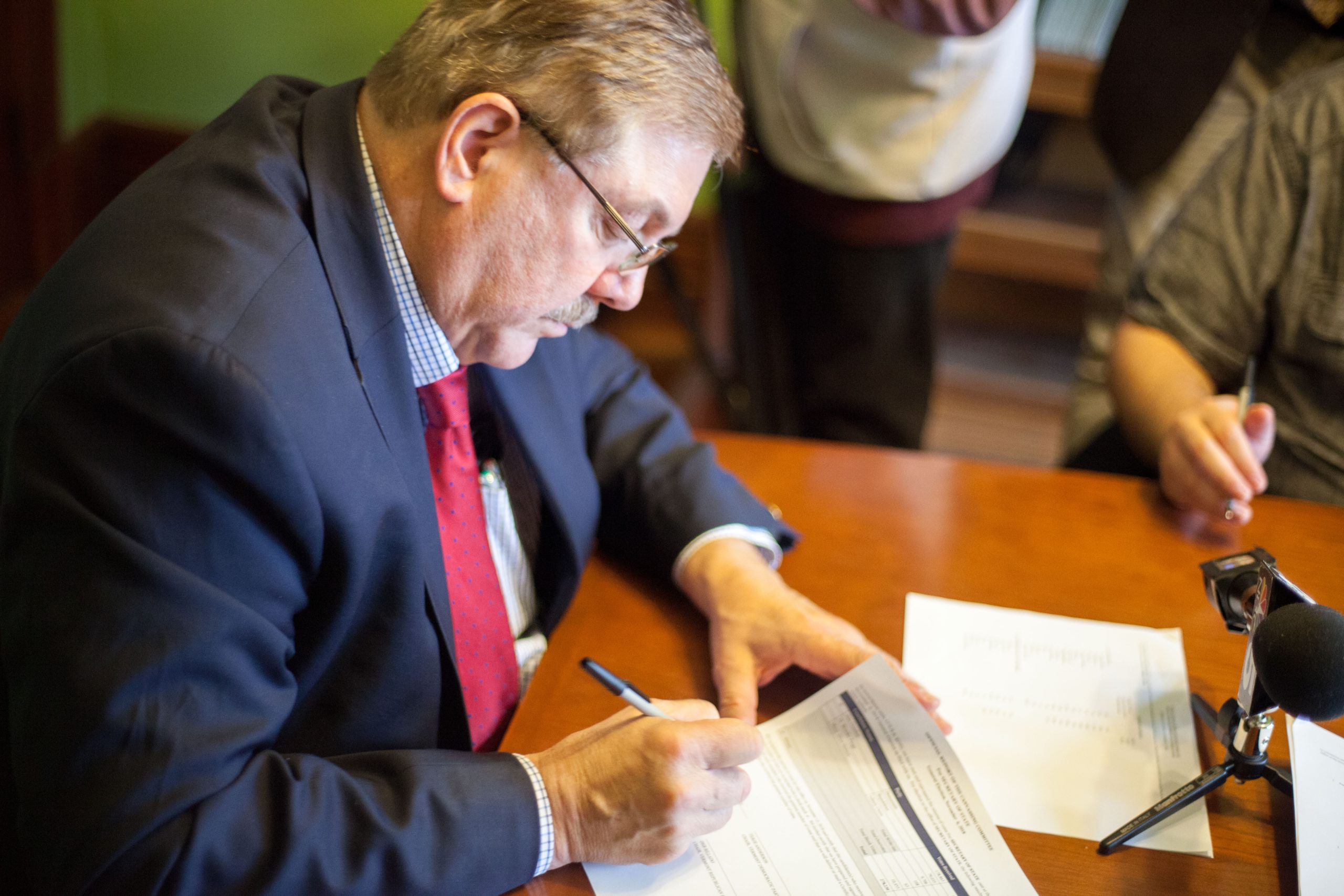 Jim Condos signing certificate