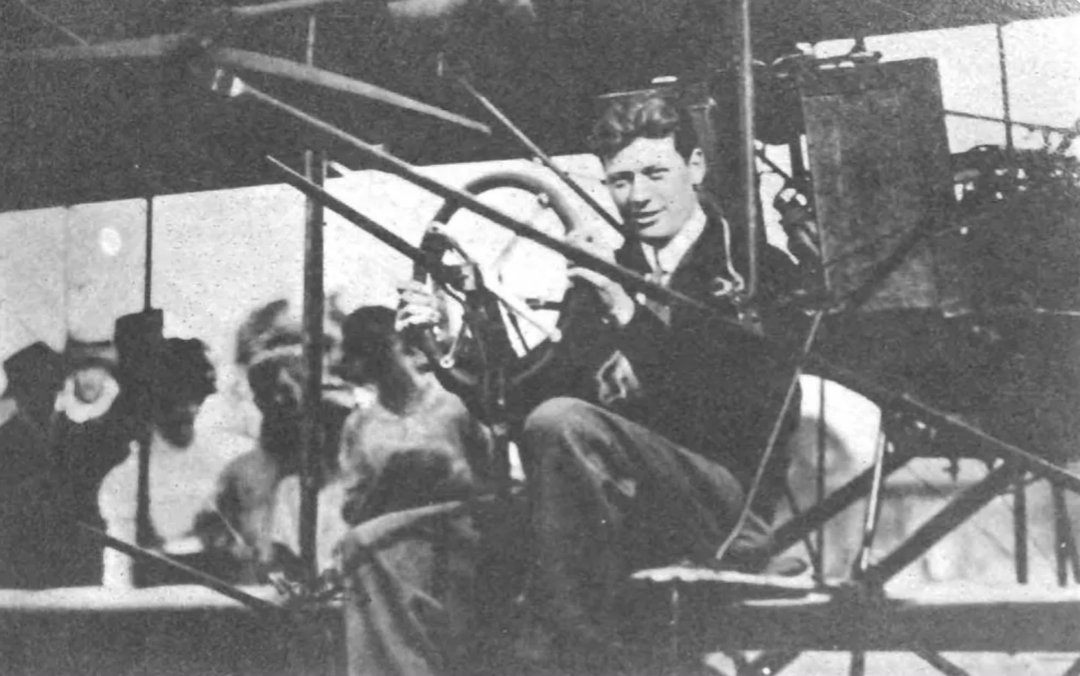 George Schmitt at the controls of his airplane