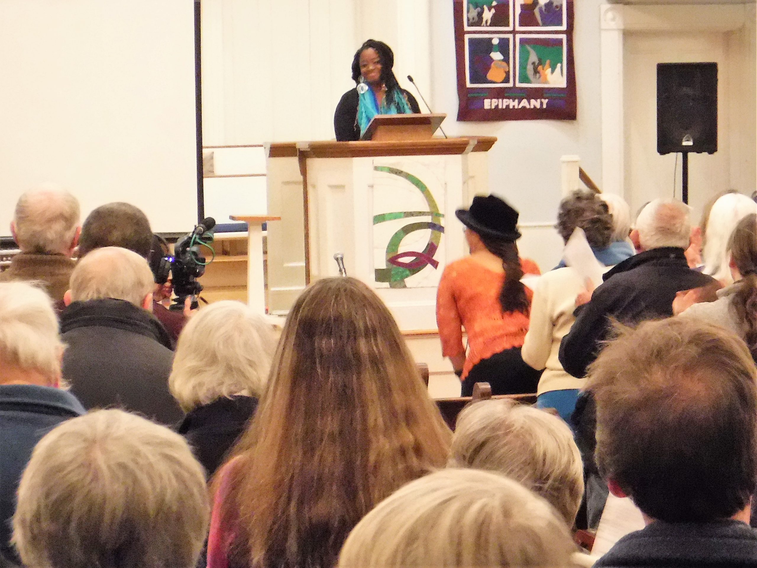 Former Bennington state Rep. Kiah Morris receives a standing ovation.