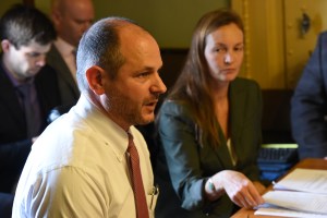 Shayne Lynn, executive director of the Champlain Valley Dispensary, gives testimony