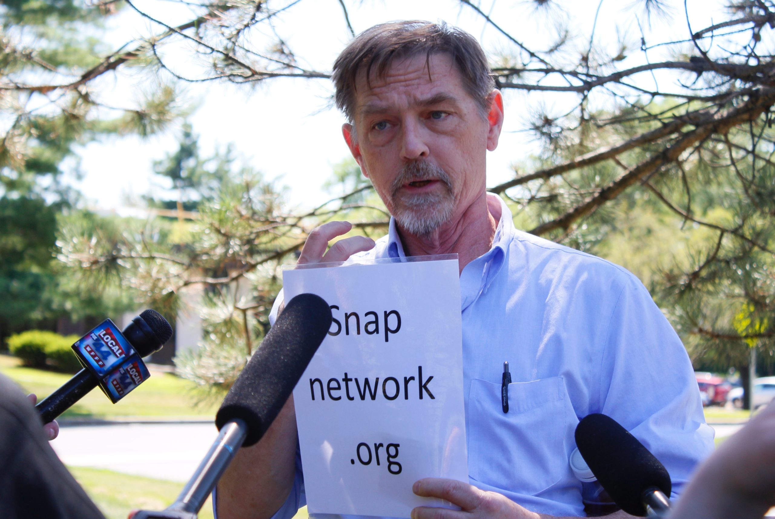 David Clohessy, longtime former leader of the national Survivors Network of those Abused by Priests, speaks with reporters outside the office of the statewide Roman Catholic Diocese of Burlington. Photo by Alexandre Silberman/VTDigger
