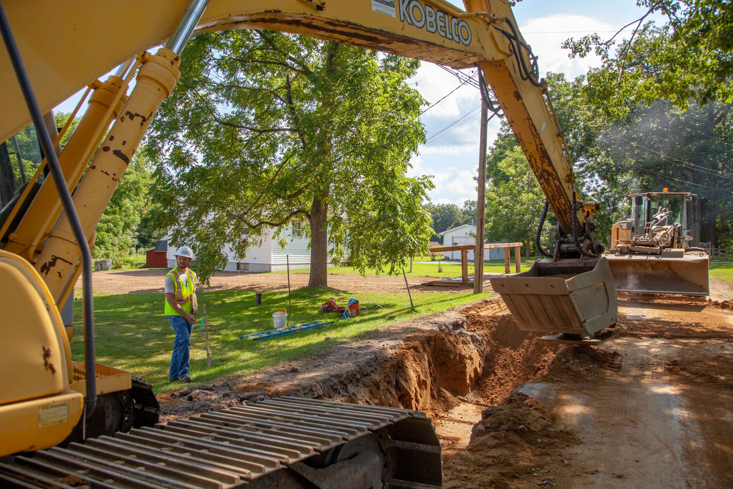 Construction crew works on water line extension