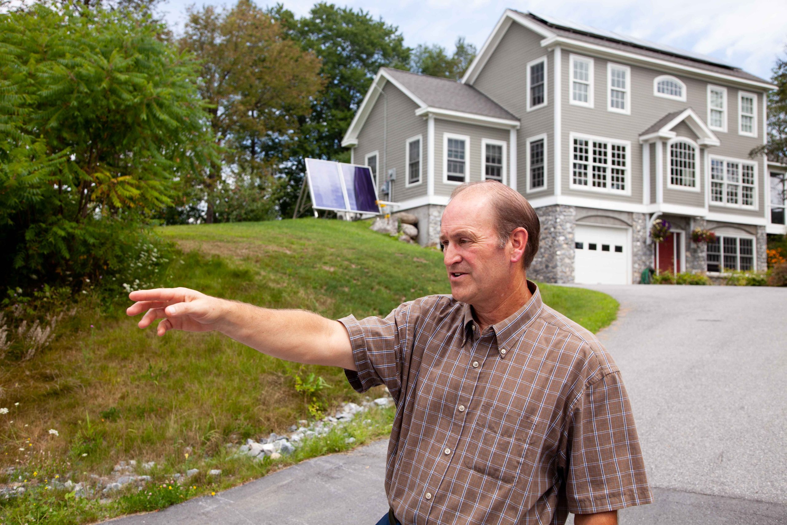 Jim Sullivan pointing at road