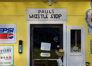 The entrance to Paul's Whistle Stop in Barnet, which closed Wednesday after its owner crashed into the gas pumps out front and died. Photo by Justin Trombly/VTDigger