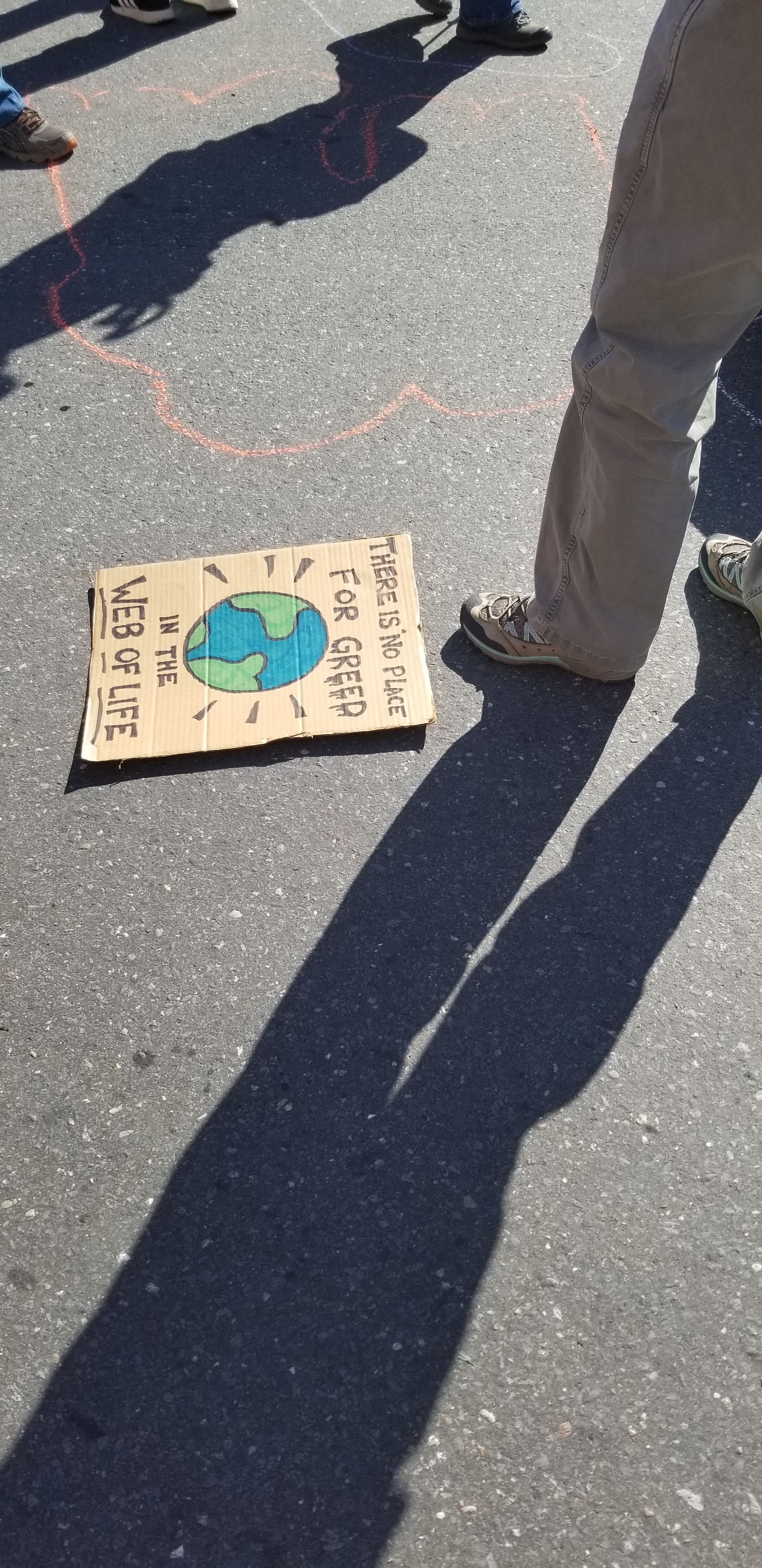 There is no place for greed in the web of life sign