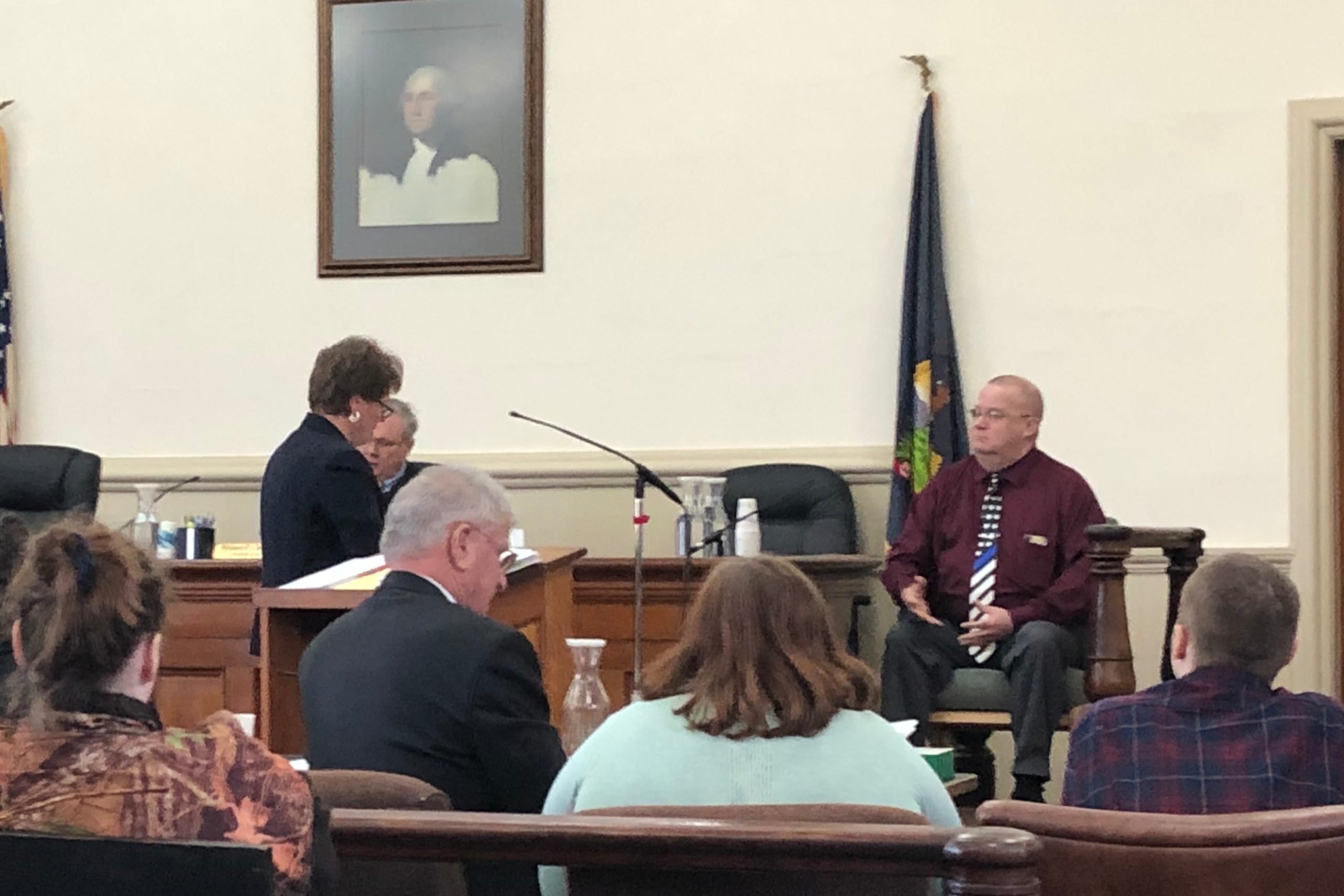 Ludlow Police Chief Richard King, right, takes the stand during a trial in Woodstock Monday in which the Department for Children and Families is accused of failing to protect two children. Photo by Ellie French/VTDigger