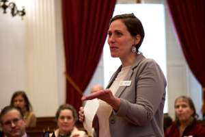 Abby Long, director of the Kingdom Trail Association, talks about Act 250 with members of the House Rural Development Caucus on Tuesday. Photo by Justin Trombly/VTDigger
