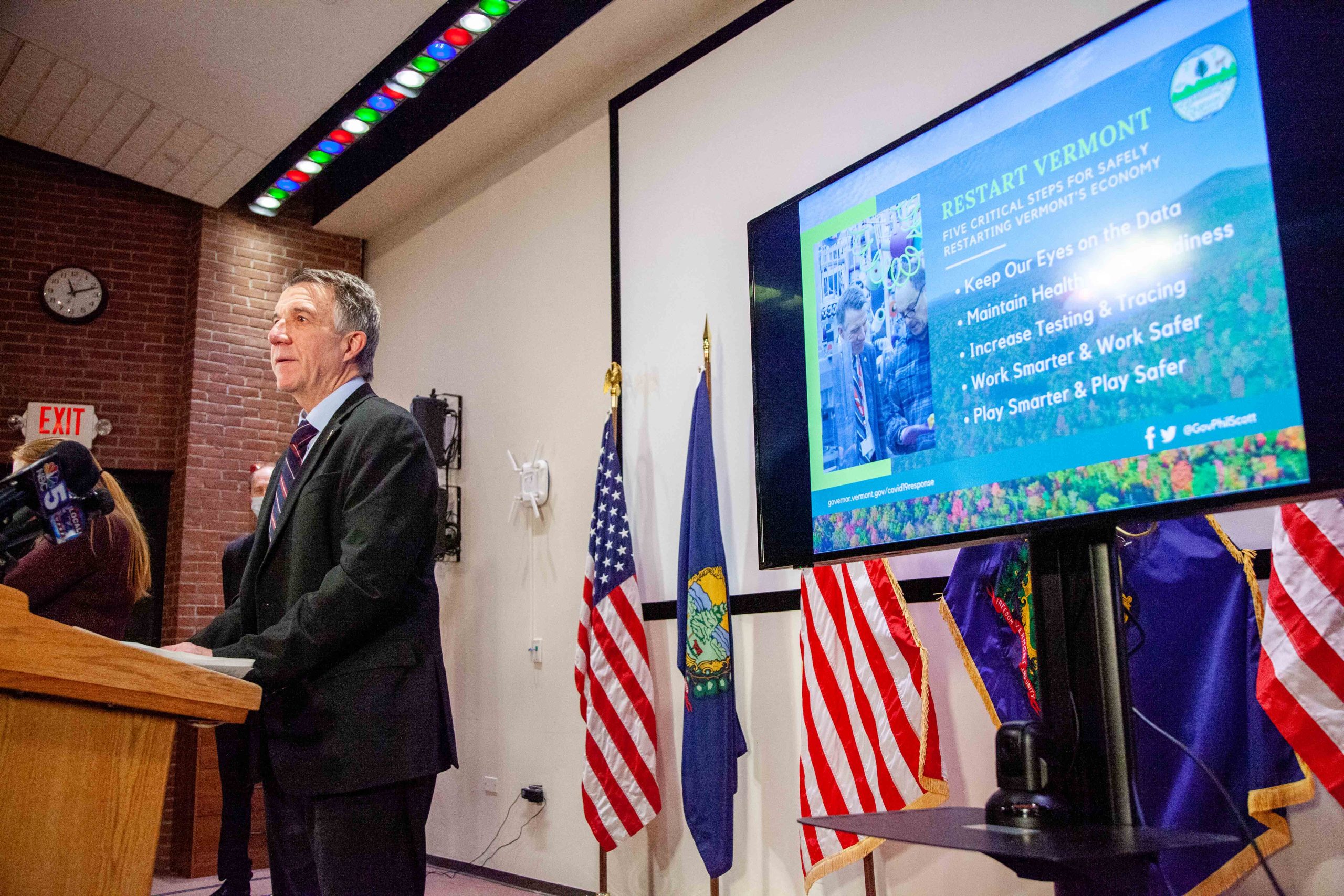 Phil Scott with "restart Vermont" slide