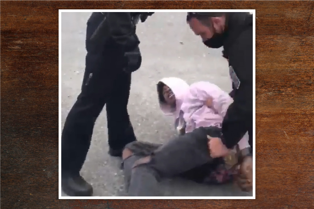 Black teen being arrested