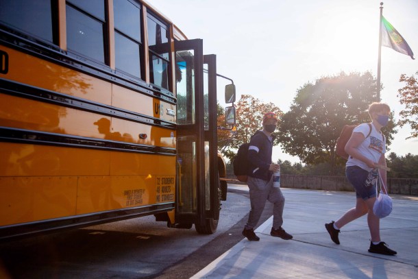 Students exit school bus