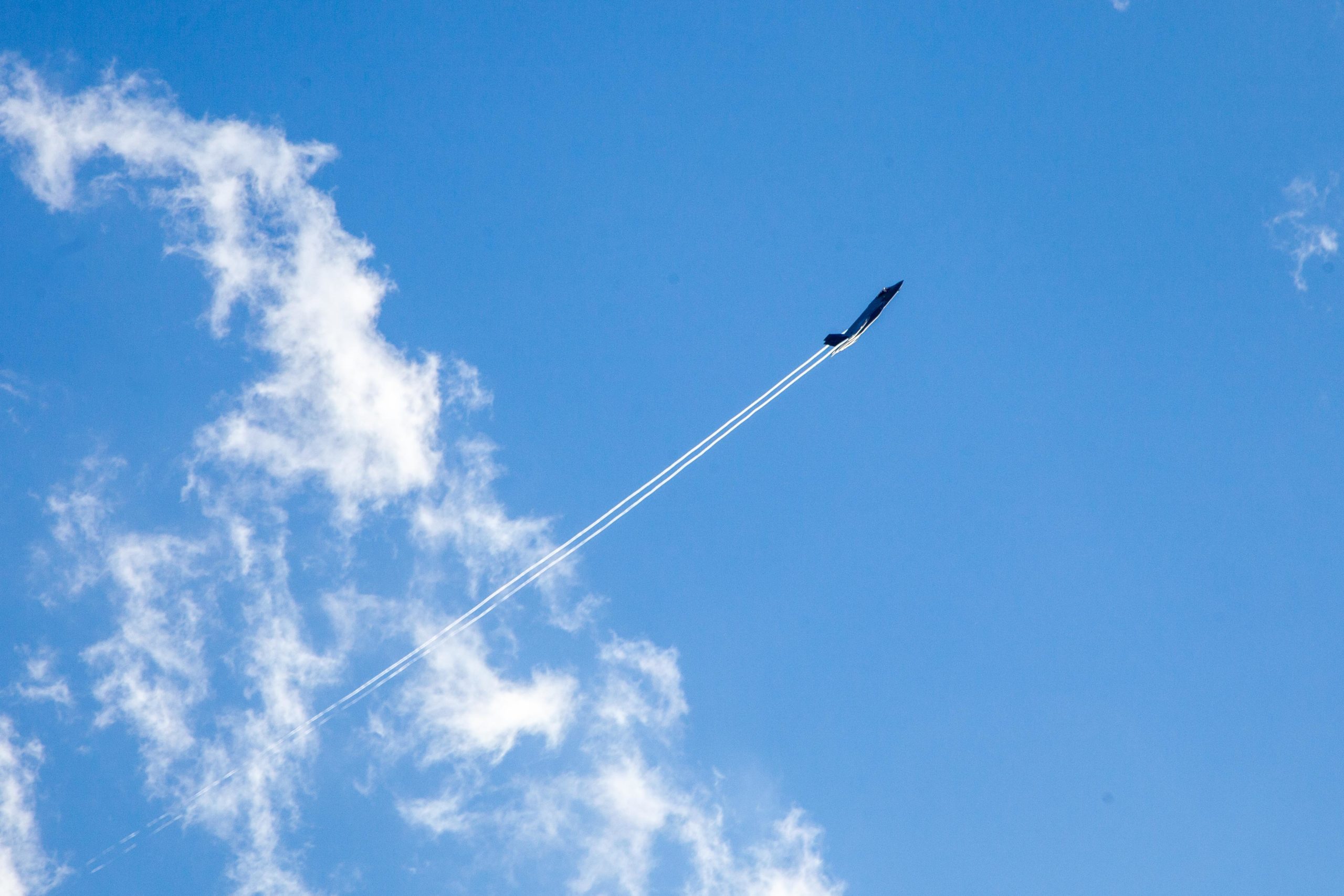 F-35 fighter jet with contrails