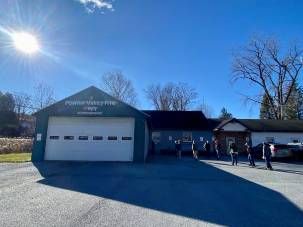 Building with line of voters