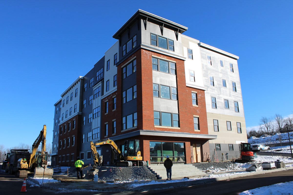 A large apartment building is under construction.
