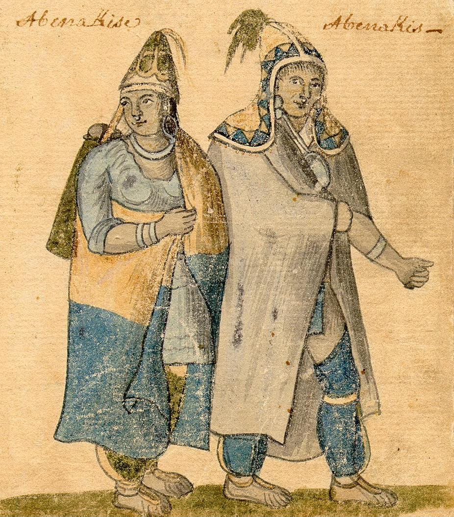 Two native americans dressed in traditional clothing.