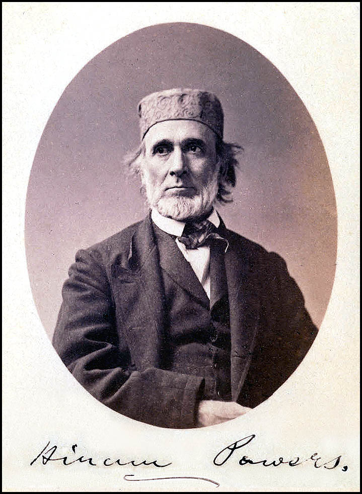 An old photograph of a man wearing a hat.