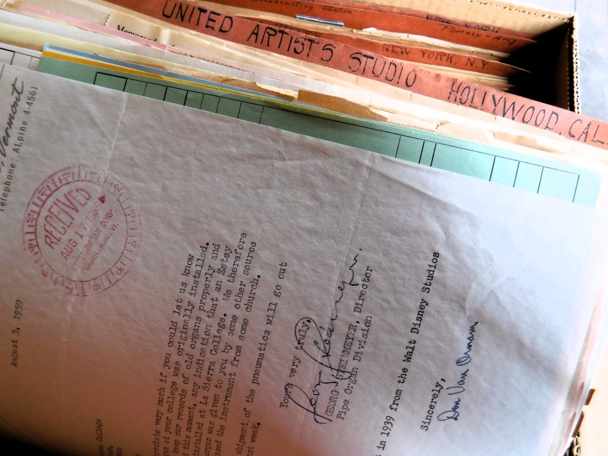 A box full of papers and papers in a box.