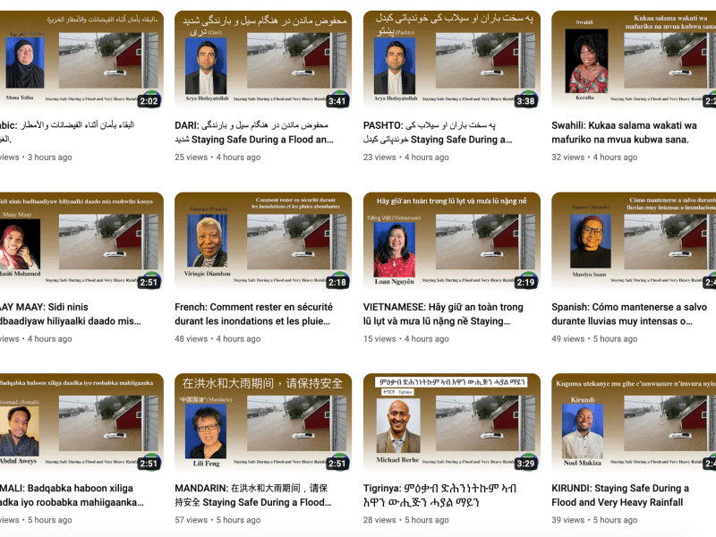 a group of people are shown on a screen.